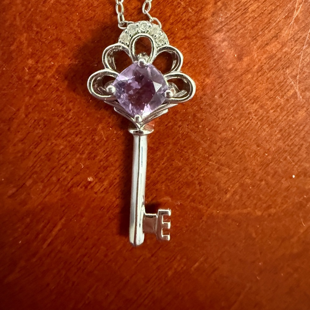 JTV silver key charm with chain, with Amethyst and white sapphire accents.